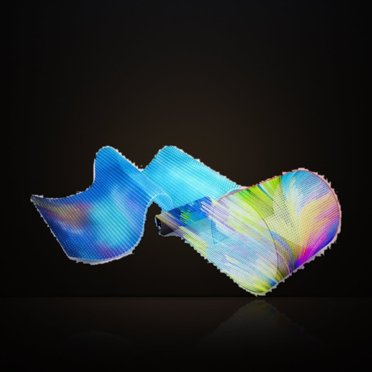 A sheet of LED film bent into a wave, running colourful content
