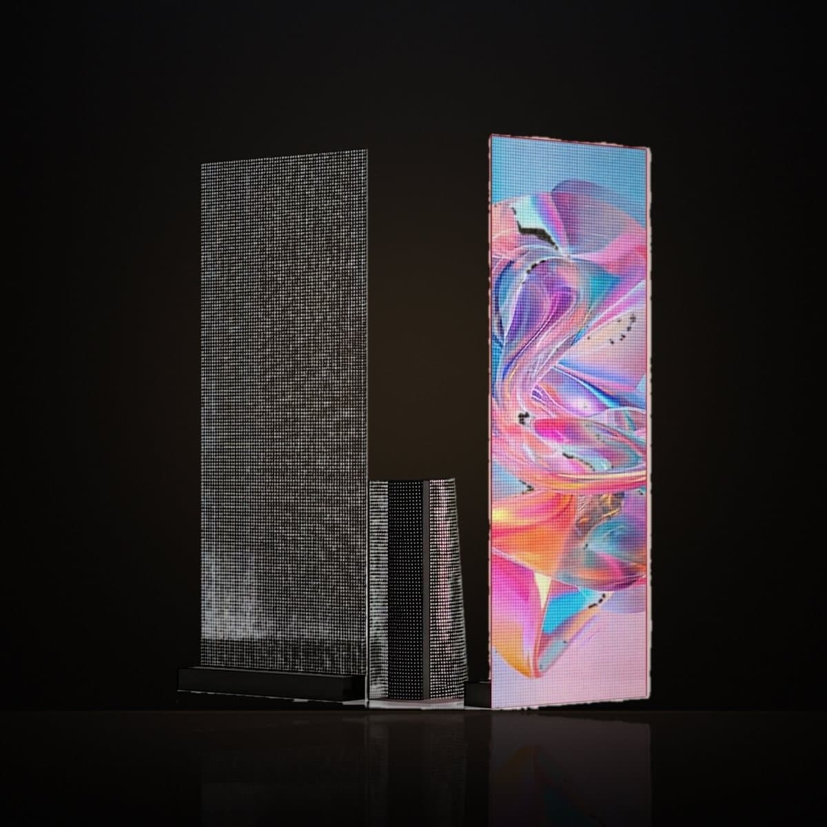 LED film panels standing side by side, one running bright colourful content