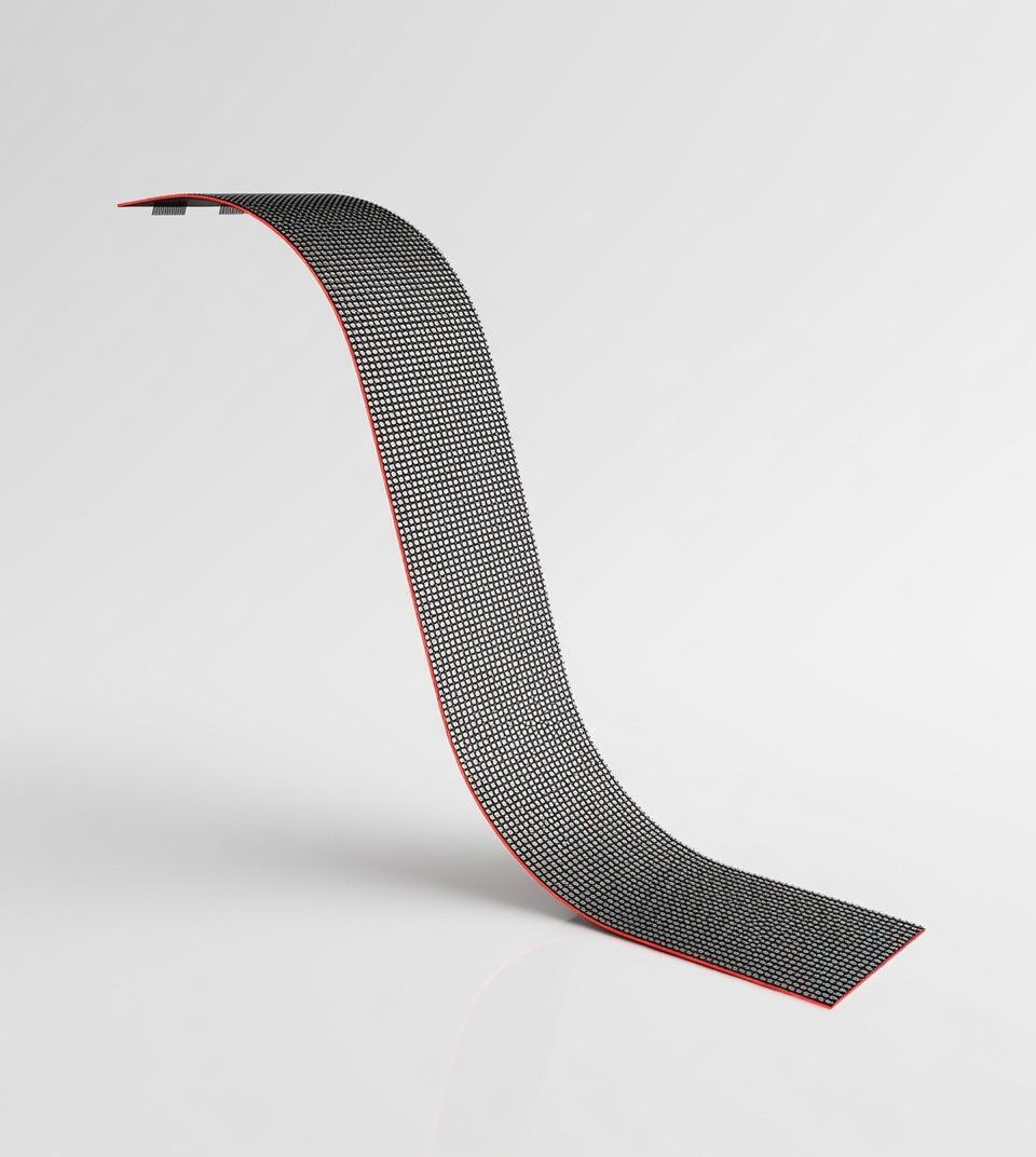 Flexible transparent LED film curved into an S shape